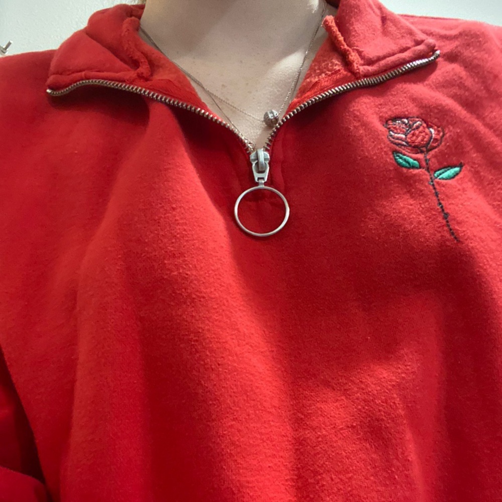 red zip up sweater with rose embroider